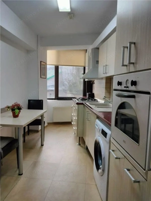 INCHIRIEZ APARTAMENT MODERN 2 CAMERE UNIRII  | NERVA TRAIAN - imagine 3