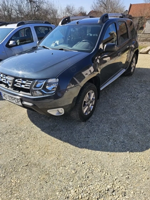 Dacia Duster Laureate 1.5 dci 110 cp 4x4 - imagine 2