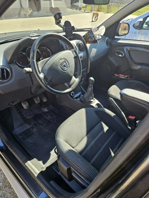 Dacia Duster Laureate 1.5 dci 110 cp 4x4 - imagine 4