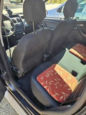 Dacia Duster Laureate 1.5 dci 110 cp 4x4 - imagine 6