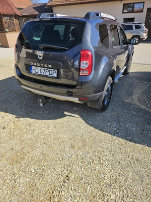 Dacia Duster Laureate 1.5 dci 110 cp 4x4 - imagine 3