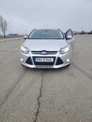 Ford Focus 1.6 benzina 150 cai  - imagine 4