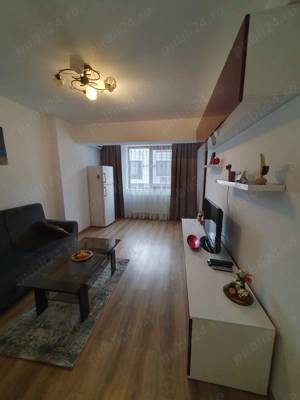 Inchiriez apartament cu 3 camere ,mobilat ,utilat modern ,et 1.