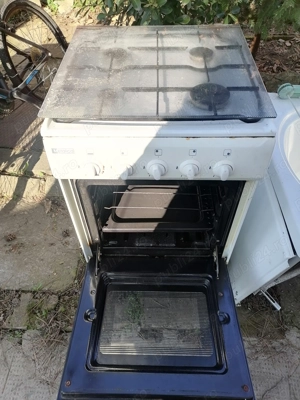 Vind aragaz cu patru și cuptor 