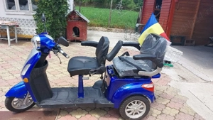 Vand tricicleta electrica.