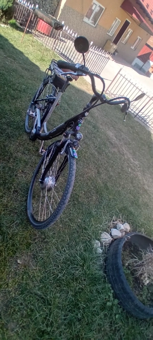  Bicicletă electrică. 