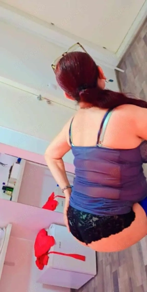 Doamna matura de 58 ani