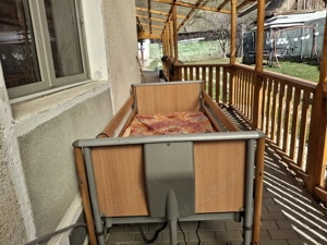 Pat electric cu telecomanda pentru persoane cu dizabilitati