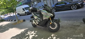 Schimb cu BMW CE 04 + diferenţă - imagine 3