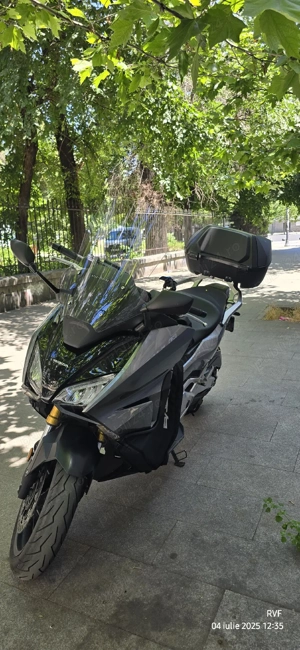 Schimb cu BMW CE 04 + diferenţă - imagine 5