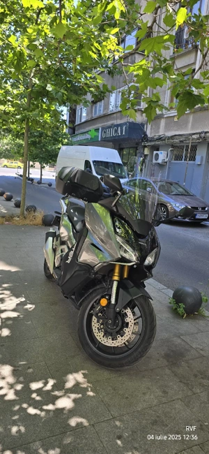 Schimb cu BMW CE 04 + diferenţă - imagine 4