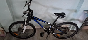 Bicicleta medie in stare perfecta de functionare ...schimbator viteze si frane Shimano