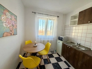 Apartament o camera in regim hotelier - imagine 4