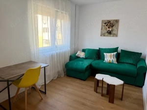 Apartament o camera in regim hotelier - imagine 2