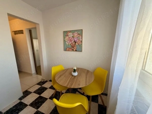 Apartament o camera in regim hotelier