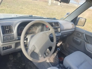 Suzuki Jimny Cabrio III 1.3 16V (80 CP) 4WD - imagine 4
