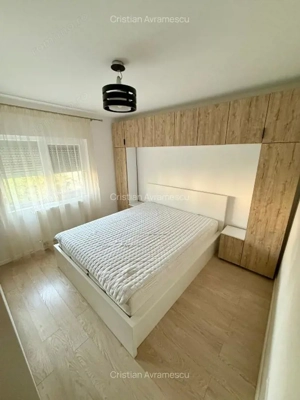 Ofer spre inchiriere ap.decomandat cu 2 camere in Zona Bucovina, et.3, suprafata utila de 54 mp. - imagine 2