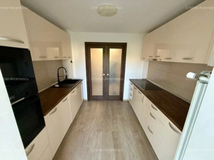 Ofer spre inchiriere ap.decomandat cu 2 camere in Zona Bucovina, et.3, suprafata utila de 54 mp. - imagine 4