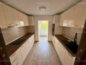 Ofer spre inchiriere ap.decomandat cu 2 camere in Zona Bucovina, et.3, suprafata utila de 54 mp. - imagine 3