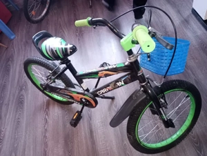 Vând bicicleta copi pt 3   6 ani