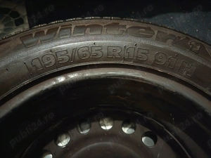 Una geantă cu anvelopă  - imagine 4