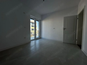 Decomandat cu bucatarie inchisa, aproape de transport in comun, la etajul 1. - imagine 6