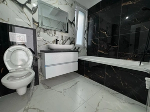 Decomandat cu bucatarie inchisa, aproape de transport in comun, la etajul 1. - imagine 7