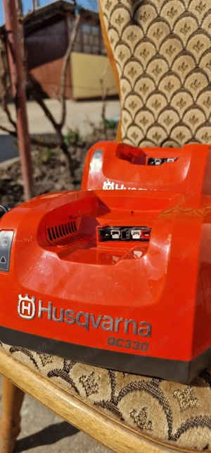 Incarcator husqvarna QC330 defect