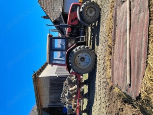 Vând tractor Belarus 1025,3 cu plug reversibil cu trei brazde 