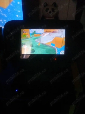 Nintendo Wii U modat cu multe jocuri pe stick in stare foarte buna schimb cu console jocuri 