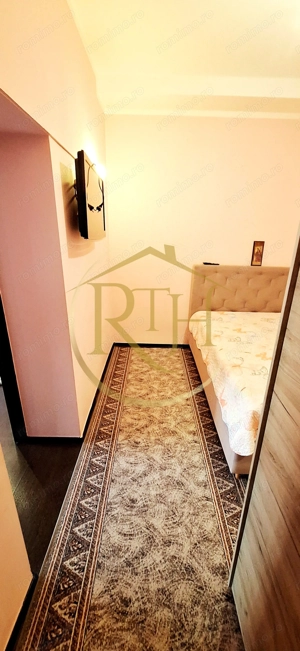 Oferim spre inchiriere apartament spatios, cu 3 camere, aproape de Nokia - imagine 11