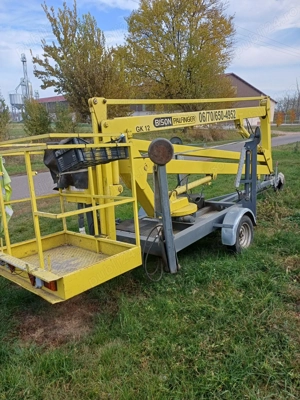 Platformă  nacelă cu braț articulat Bison Palfinger K12   12 m   pe remorcă   recondiționată