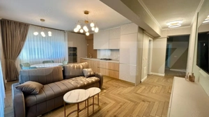 Apartament 3 camere , 80 mp , 2 bai , parcare subterana , prima închiriere 