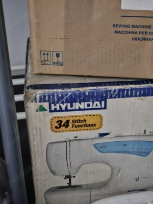 2 masini de cusut portabile