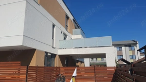 Apartament 2 camere cu bucatarie mobilata, terasa 40 mp,loc de parcare privat
