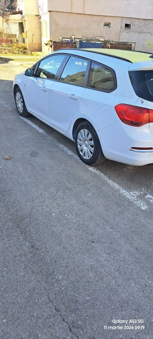 Opel Astra j 2012 ecoflex . Mai am 4 jante cu anvelope de iarna. - imagine 2