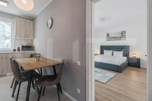 Apartament modern cu 3 camere, central, etaj 1 - imagine 2