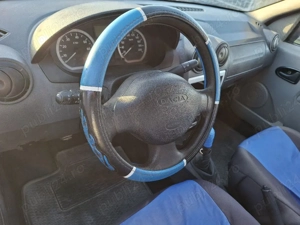 vând Logan 1.6 model full option înmatriculat poate fi reparat sau folosit pentru piese - imagine 9