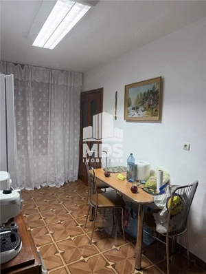 Etaj 1 cu 2 bai si 2 balcoane si garaj sub bloc