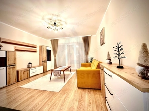 Apartament ultrafinisat 2 camere balcon 7.5 mp si parcare in Cristian - imagine 11