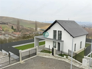 Vand casa cu 4 camere, 2 bai, suprafata utila 140 si teren 500 mp