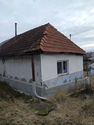 Casa batraneasca pe teren mare