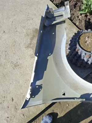 vand aripă stânga ,far dreapta Dacia logan 2008 - imagine 4