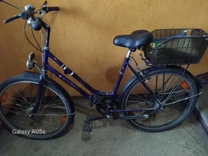 vând bicicleta roti 26 este dama 