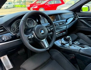 BMW Seria 5 520d - imagine 9