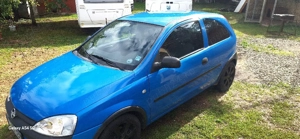 Opel Corsa 1.2 16V 75 CP - imagine 6