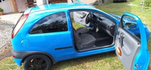 Opel Corsa 1.2 16V 75 CP - imagine 4