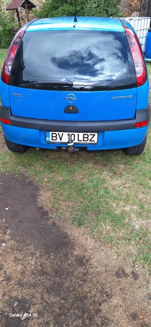 Opel Corsa 1.2 16V 75 CP - imagine 7