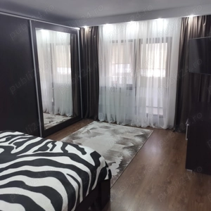 Vând apartament 2 camere mobilat și utilat cu suprafața utilă de 70 mp