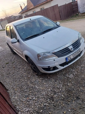vand dacia logan 2011 - imagine 3